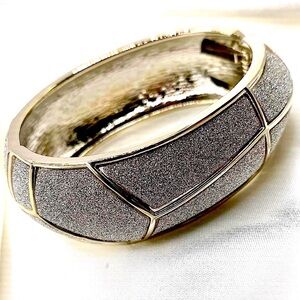 Sparkling silver toned chunky hexagon bangle clamp bracelet.